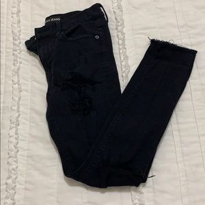 Black distressed jeggings from Epxress